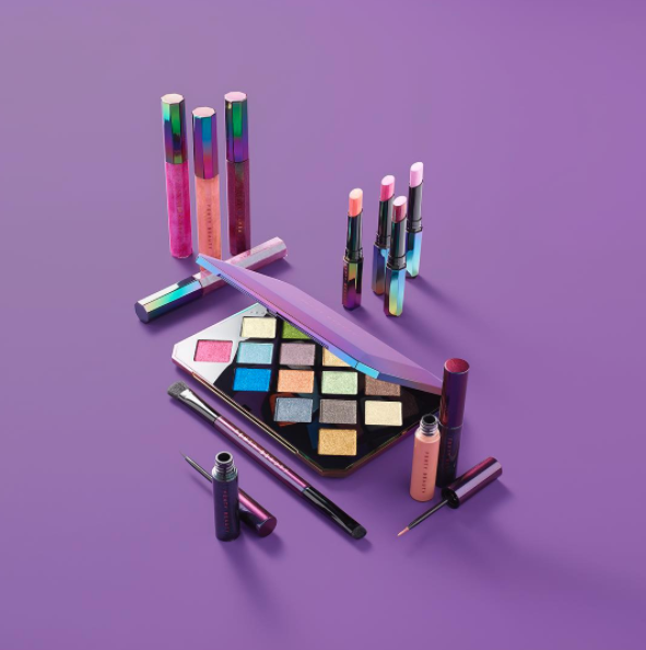 The latest release is called the Galaxy Collection and it includes the Galaxy Eyeshadow Palette, Starlit Hyper-Glitz Lipstick, Cosmic Gloss Lip Glitter, Eclipse 2-In-1 Glitter Release Eyeliner, and the special 2-Way Eyeshadow Brush.