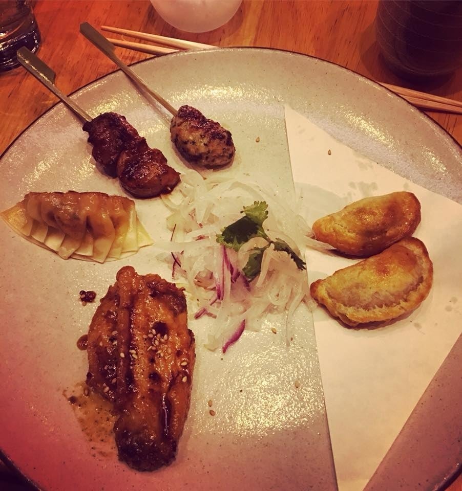 This perfect platter features all the hot - both figuratively and literally - items from the appetizer menu. From the Shrimp Crab Gyoza with crispy edges and Black Feather Chicken Wing in sweet and savory Aji Panca Amakara sauce to two different kinds of Empanadas - one stuffed with minced chicken in Japanese curry and the other with pisco roasted Porcon mushroom - to Robataya Skewers (Tsukune, or chicken meatball, and Anticuchos de Corazon, or beef heart).