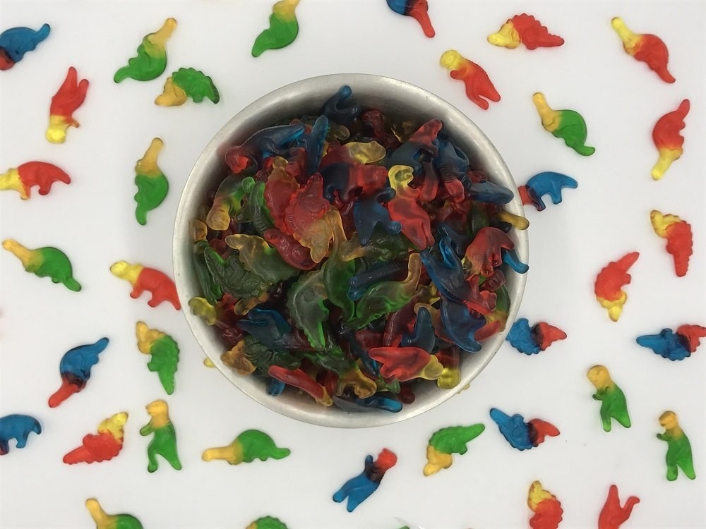 assorted, multicolored gummy dinosaurs