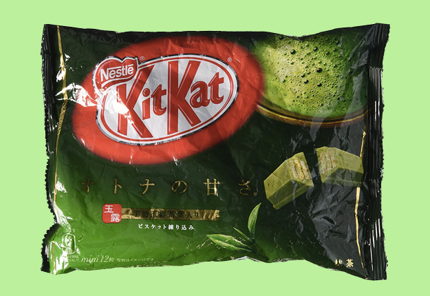 a green bag of green tea kit kats