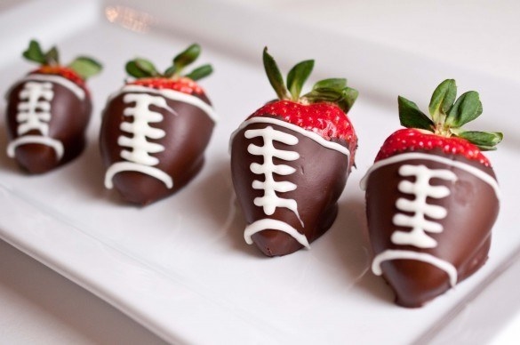 Complete your watch party with football themed desserts, like these Chocolate Strawberry Footballs