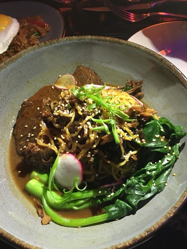 In this unique interpretation of a favorite Chinese dish, Beef & Broccoli highlights tender, smoked short rib and Chinese broccoli with a generous serving of lā miàn noodles dressed in garlic hoisin. While the dish could have used a bit less salt, it is guaranteed to satisfy your palate.