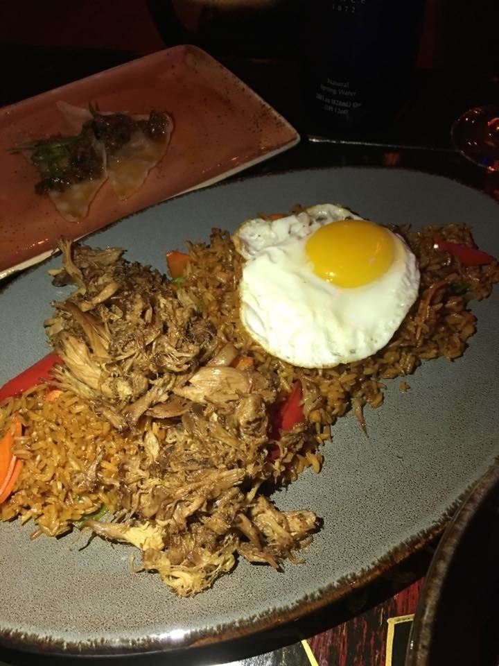 By far my favorite dish of the evening, Pato Frito features confit duck that has been glazed in sour orange sauce over flavorful fried rice. The dish is topped with sunny side egg, whose glossy yolk you can pop over the rice for an unforgettable bite.