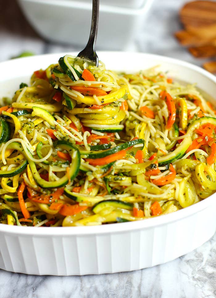 Angel hair pasta gets bulked up with spiralized zucchini, carrots, and squash. Then the whole thing gets tossed in nutty pesto (which you can whip up from scratch or buy pre-made). Get the recipe.