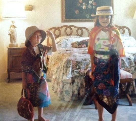 My grandma had to babysit for my sister and I once and she let us raid her entire collection of silk scarves, old purses, and stylish hats. This photo was the result. All the signs were there... I just never realized or came to terms with it until 15 years later when I moved across the country for college. —andrewwhitfieldc