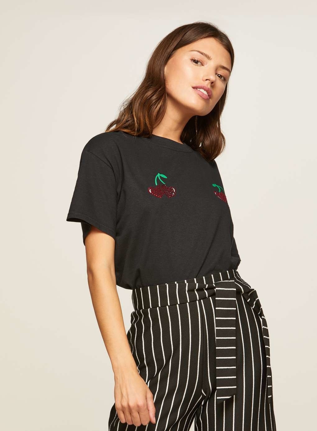 38 Awesome Graphic Tees To Layer Under Your Cardigans