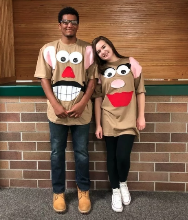 two people dressed like Potato Heads