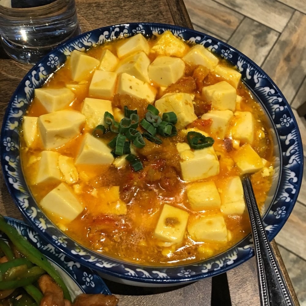 Chunks of soft tofu is mixed in with flavorful crab meat and ginger, then simmered in sweet and sour sauce. The dish is a perfect compliment to a bowl of rice so that you can soak up all the flavor.