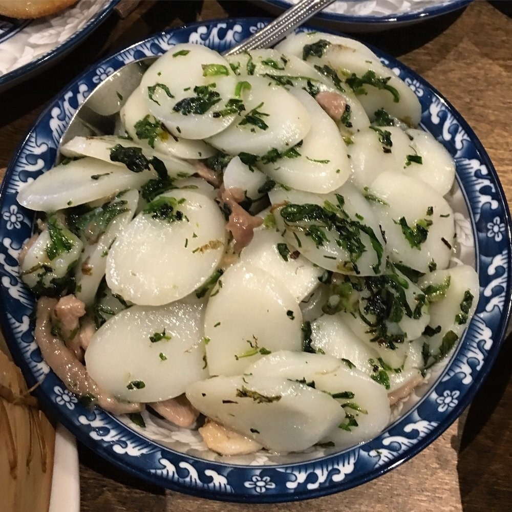 Slice rice cake is stir-fried with shredded pork, green capsella flower, and sesame oil in this classic dish - Shanghai Rice Cake. The dish lacked depth of flavor, but I still enjoyed the chewy rice cake.