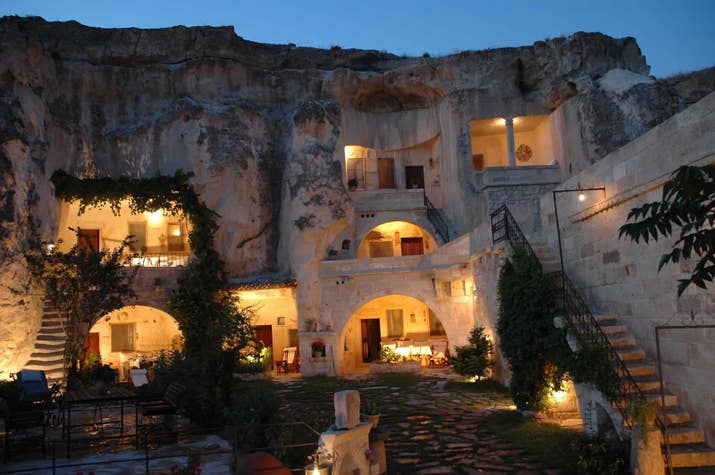 If you’re claustrophobic, you’d best avoid the Travellers Cave Hostel. The dorms are built into the cave from sandstone rock and separated by arches. From your room, look out upon the Fairy Chimney Rock formations, and the surrounding villages of Goreme. You can tour the underground city, or even take a hot air balloon ride nearby the hostel! Whilst most visitors travel to Turkey with no problems, there are occasions where it is dangerous to visit. Make sure to check out the FCO’s travel information page if you plan to spend a night underground...