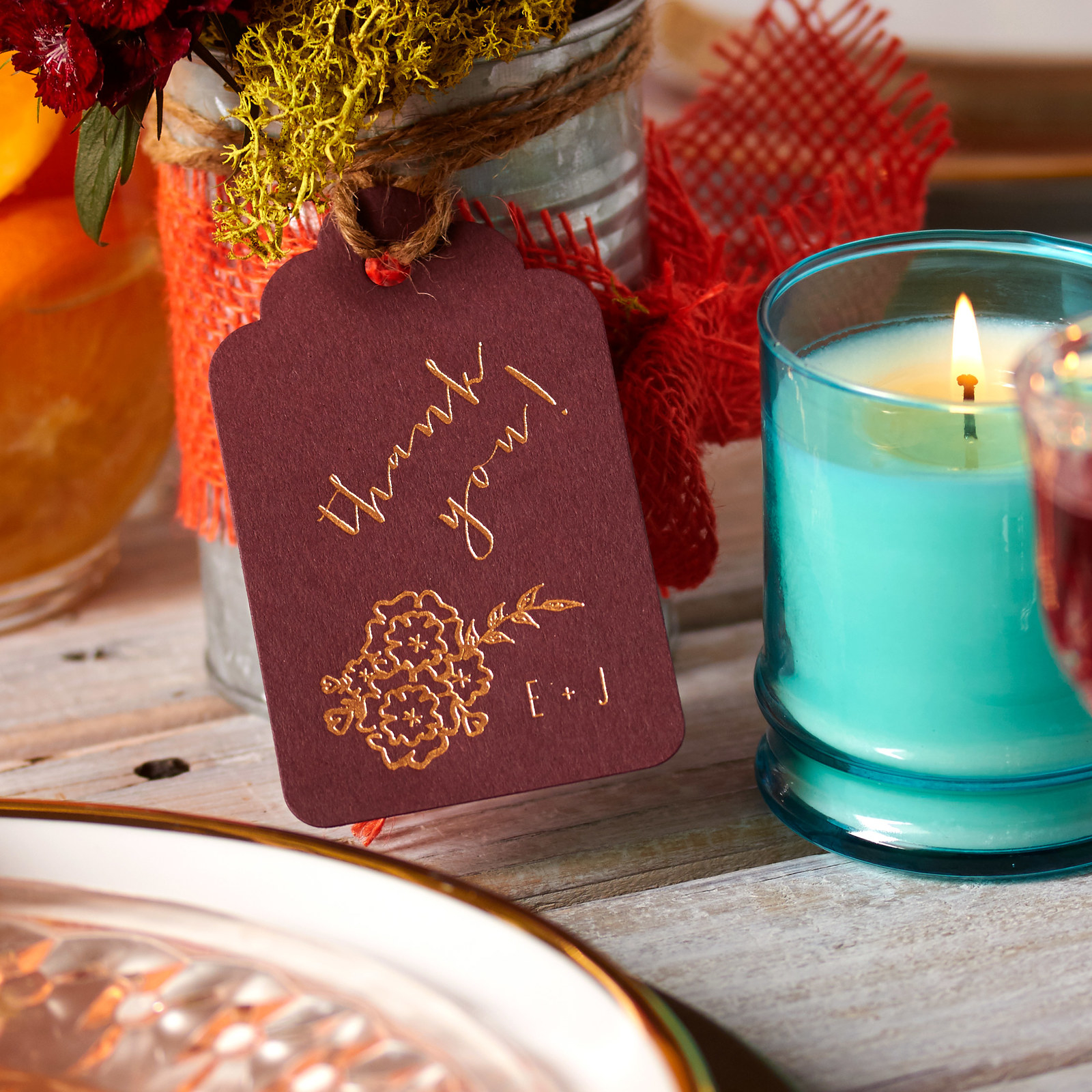 Gift your friends and family with festive favors. A fall scented candle with a custom tag from ForYourParty.com is the perfect takeaway!
