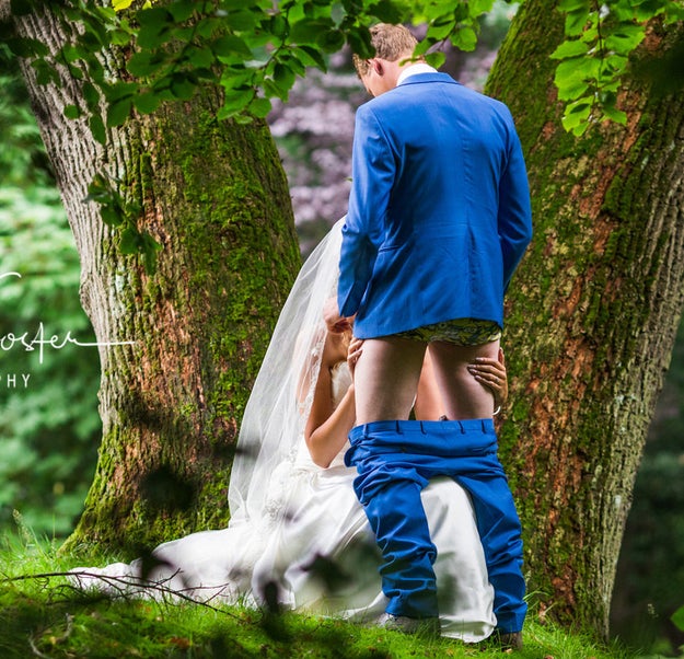 In case you're adjusting your screen, yes, it's a picture of a bride simulating giving her new husband a blow job, surrounded by the kind of gorgeous leafy trees anyone would want dotting the grounds of their wedding venue.