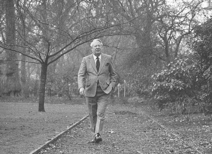Former prime minister Edward Heath takes a walk near his London home in 1985 on the anniversary of his 35 years as MP for Bexley.