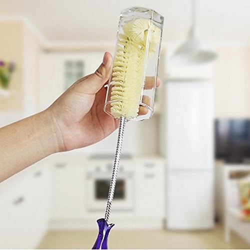 Brush is BPA-free and made from non-toxic materials. Measures 15.7