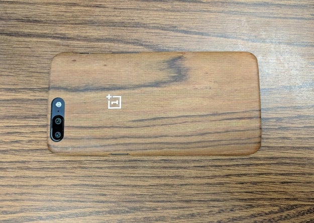 This phone case that blends in perfectly with the faux-wood surface it's on.