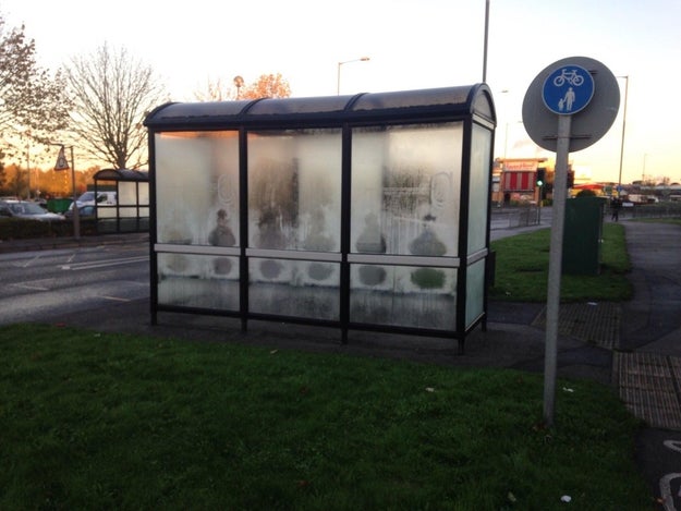 This bus stop that looks kinda haunted due to some weird condensation.