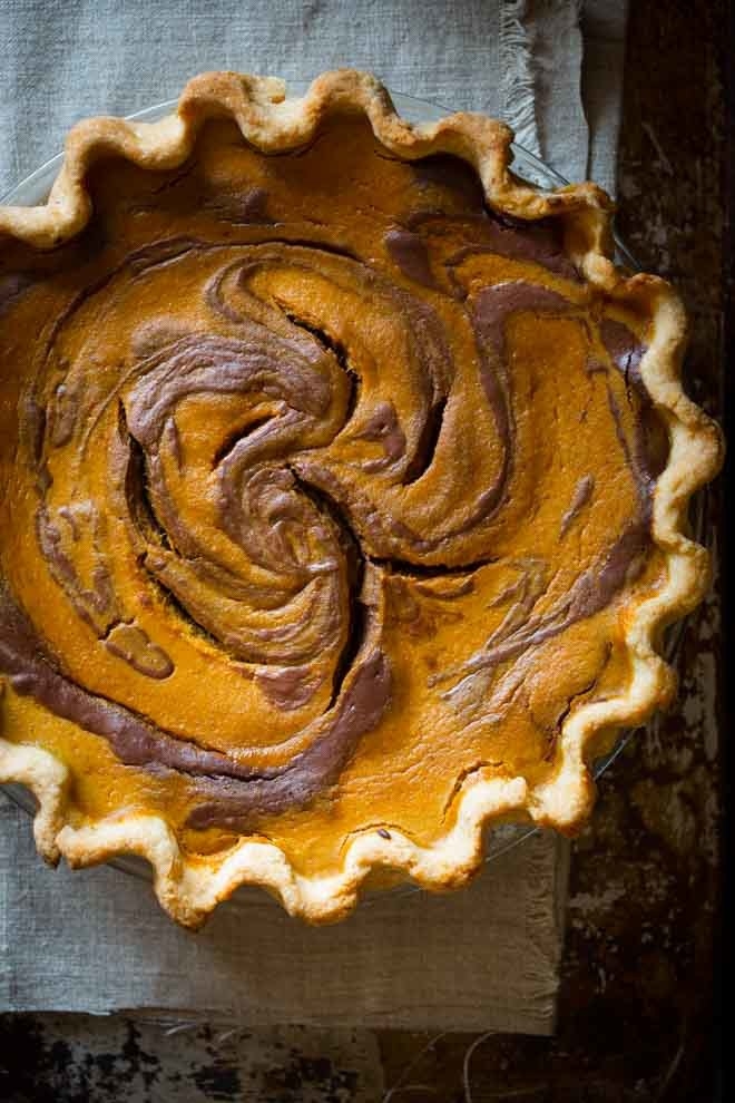 Classic pumpkin pie gets a major upgrade with a simple swirling of melted chocolate and butter. Once baked, it turns into a beautiful pattern that only looks like it took ages to make. Get the recipe here.