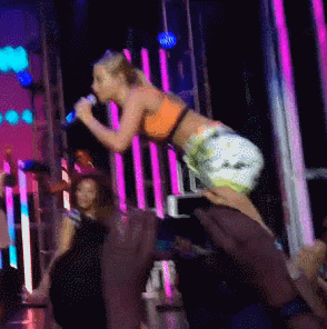 Iggy Azalea Took A Nasty Fall Onstage But Continued To Perform...Sitting  Down