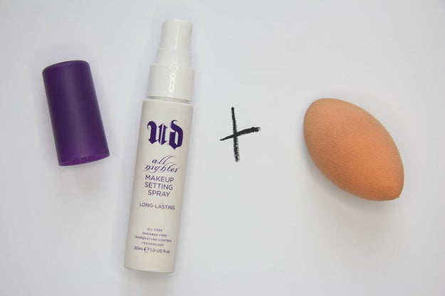 Wet your Beautyblender with setting spray to actually mix it into the foundation.