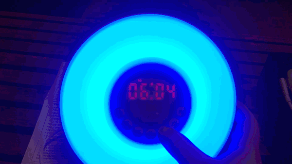 The Totobay, with its 10 brightness levels, doesn’t offer such a nuanced “sunrise” or “sunset” as the Philips does (see GIF below), but it does offer a) six light color options for if you want to go all James Turrell on your morning routine’s ass, and b) a fully dimming digital display that saves people like me from self-destructively peeking at the time whenever we wake up at night. Sonically speaking, it offers 15 volume level options, six pre-loaded bird, nature, and other noises, and a radio that automatically scans and saves local stations. To snooze, press the designated button at the center of the clock face.