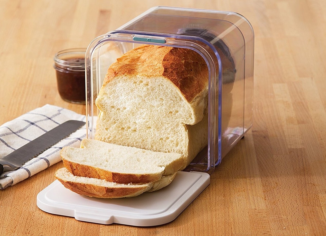 A loaf of bread stored in the clear container
