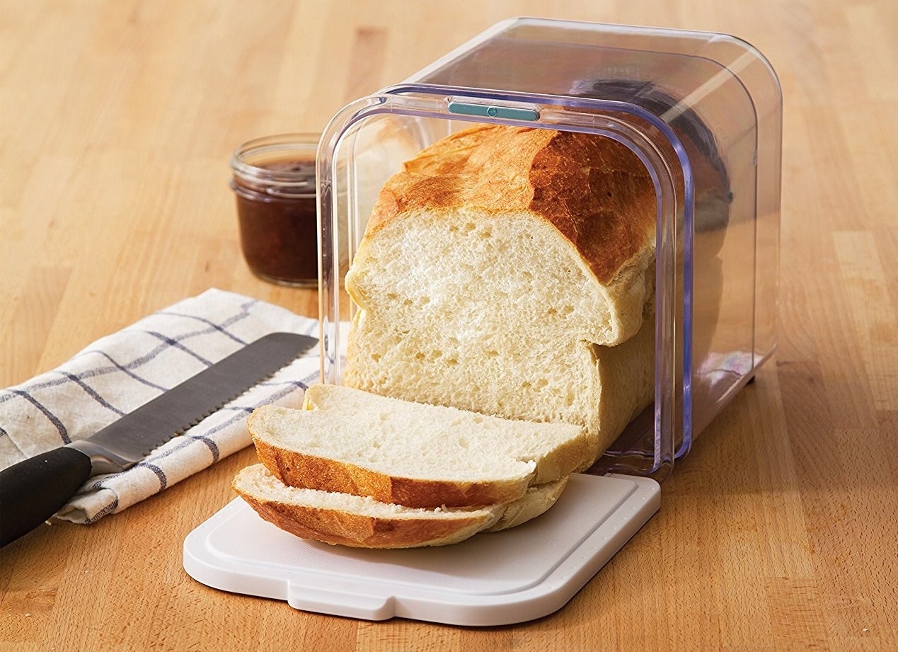 A loaf of bread stored in the clear container