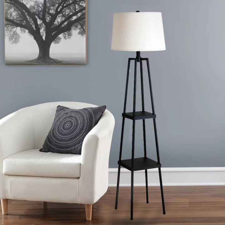 four legged tall lamp with two shelves in the base