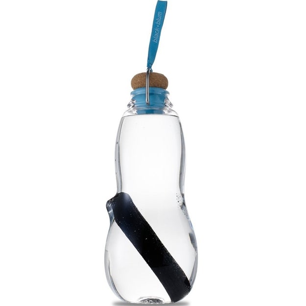 A water bottle with a charcoal log inside that doubles as a water filter.