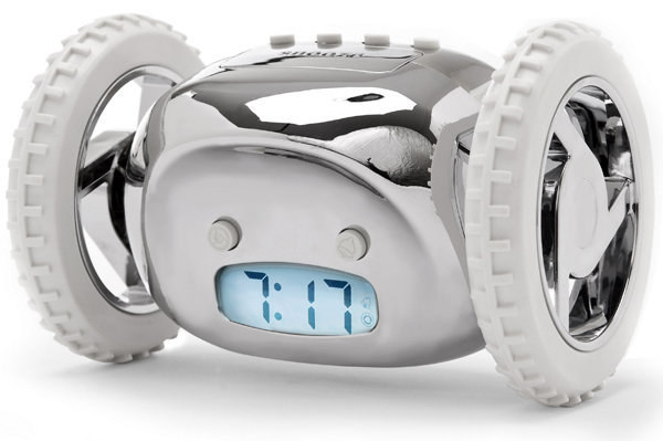 This next invention to get you out of bed... may drive you insane. But if it's an effective way to get you out of bed, perhaps you could simply turn it into an exercise routine. The runaway alarm clock will, as is its name, run away from you as its alarm starts going off. It will drive around your room, in different patterns, hitting into stuff and driving into cracks that you didn't even know existed. This seems like an almost too effective alarm clock, as just after it's woken you up, you'll be throwing it out the window. The runaway clock retails for $60, and allows for hours of bedroom fun.