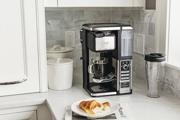 A coffee machine with a built-in frother that'll make a variety of drinks, from an iced coffee to a latte. You'll get gourmet-coffee-shop-quality joe without having to shell out triple figures for an espresso machine.