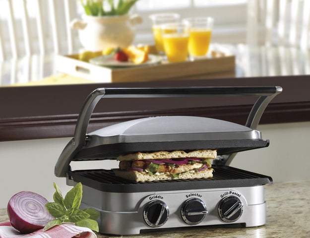 A five-in-one countertop cooker that'll grill burger patties, press paninis, fry bacon, and cook pancakes. So basically, 90% of my dietary needs.