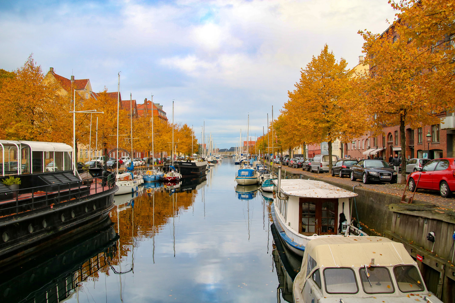 Autumn is THE season to visit Copenhagen. The city's canals are lined with countless trees that have changed from green to fiery reds and oranges, and often, their beautiful colors are reflected in the calm waters. During the fall, the weather in Copenhagen is unbeatable - it's not too hot (as it can get in the summer), and it's not nearly as brisk as it is during the chilly winter months. Plus, the summer crowds have died down tremendously, and it's quite easy to find fabulous discounts on flights, accommodations, and tours. After a long afternoon spent wandering this beautiful city, head to one of Copenhagen's quaint cafes for some delicious snacks infused with seasonal flavors, such as apple or pumpkin. If you're in town on October 31 and feeling festive, the Tivoli Gardens are famous for throwing one hell of a Halloween party.