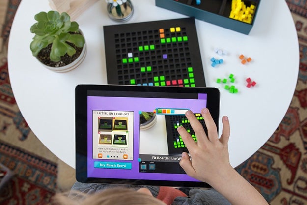 A cool-AF kit to help you build your own video game using physical and digital tools — you can use the included game board and 320 blocks to build out game rooms and characters, then use the app to scan your creation and learn to code the game.