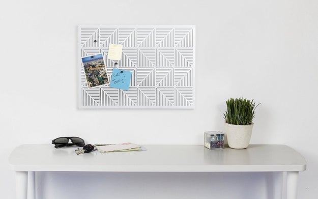 A supremely stylish metal bulletin board to add both class and functionality to any busy bee's work space.