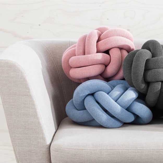 A knotted pillow as an abstract cushion perfect for lounging.