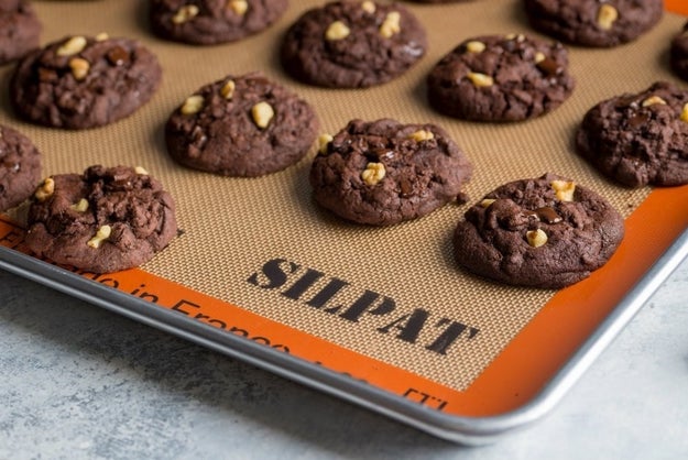 This Silpat baking mat that makes any pan nonstick, so you can stop buying parchment paper, oils, and sprays.