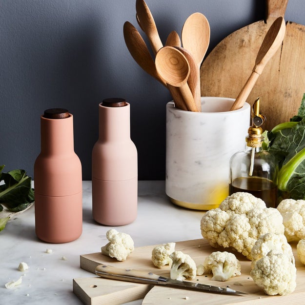 A set of minimalist salt and pepper shakers for anyone who appreciates cooking and good design.