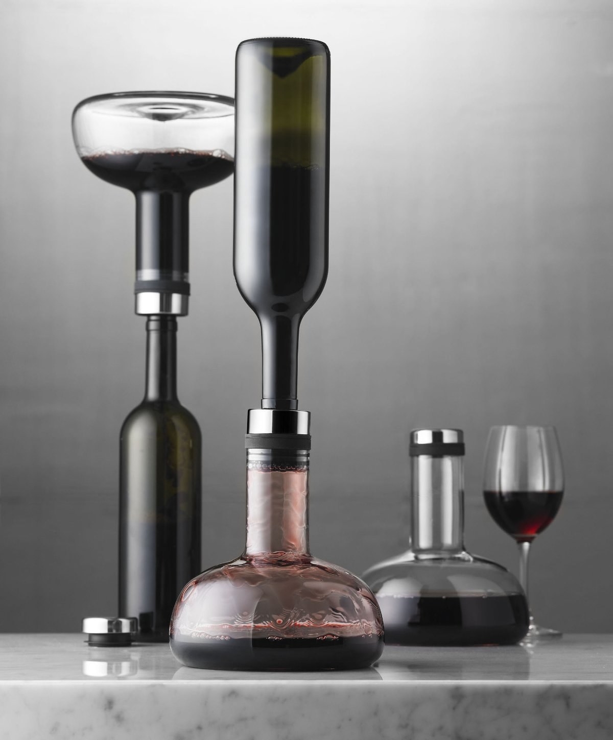 Wine decanter and glasses on display, showcasing their sleek design for potential buyers