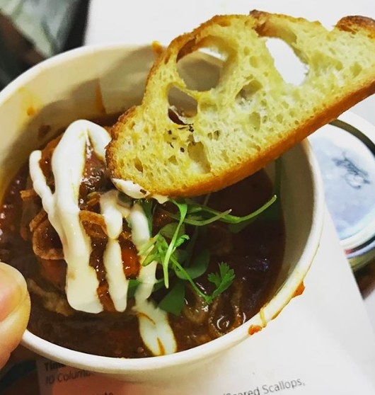 Savory lamb meatball was smothered in spicy tomato sauce, and topped with crispy shallots, drizzle of labneh, micro greens, and crunchy baguette to soak up all the sauces.