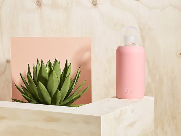 A glass water bottle with a matte silicone sleeve to inspire them to stay hydrated.