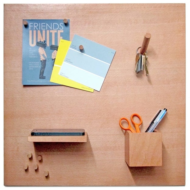 A magnetic wooden bulletin board with movable parts to better suit their organizational needs.