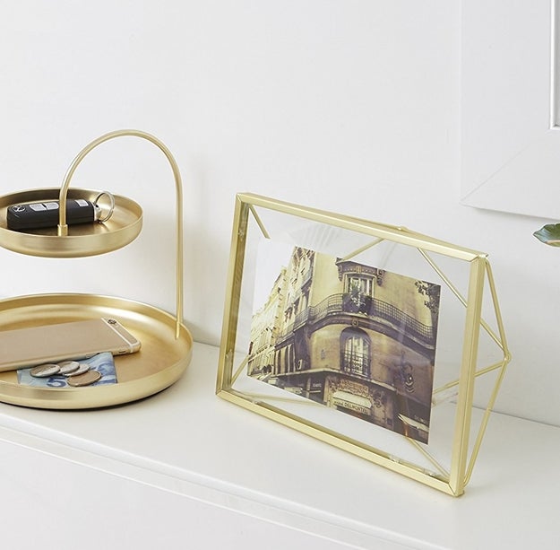 An elegant, two-tiered catch-all so they can properly display their keys and loose change.