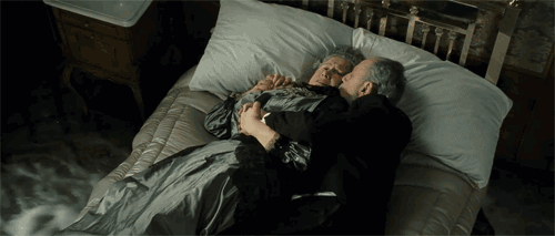 The Real Story Behind The Old Couple Cuddling In Bed In