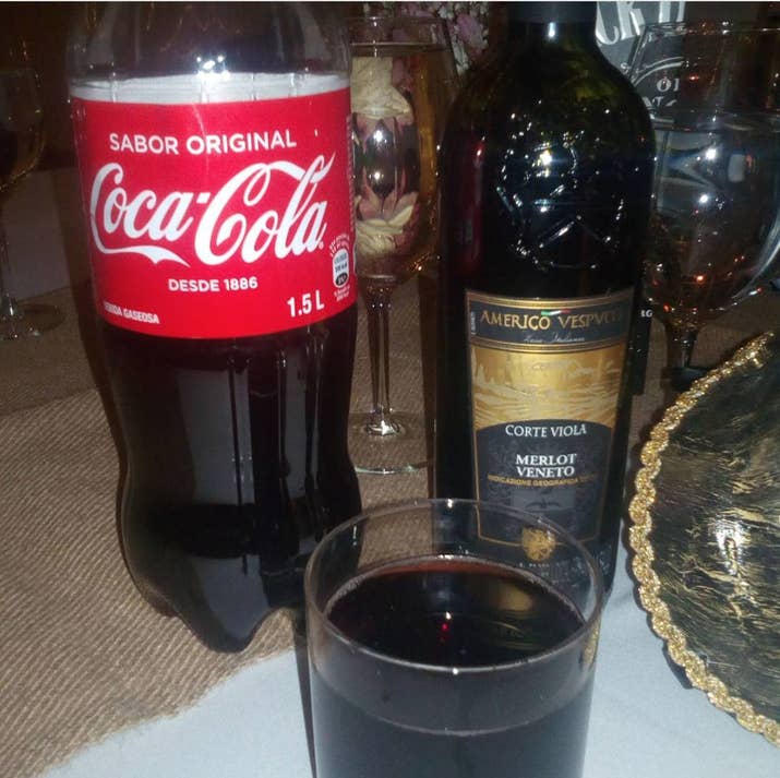 A glass, some ice, and about half wine/half coke. I love it even though everyone judges me.—jinip