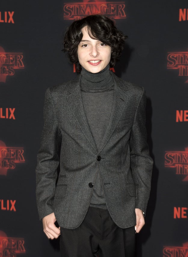 Over the weekend, 14-year-old Stranger Things actor Finn Wolfhard was called rude because he didn't stop to talk with fans waiting for him outside his hotel — and his castmates quickly shut it DOWN and defended him.