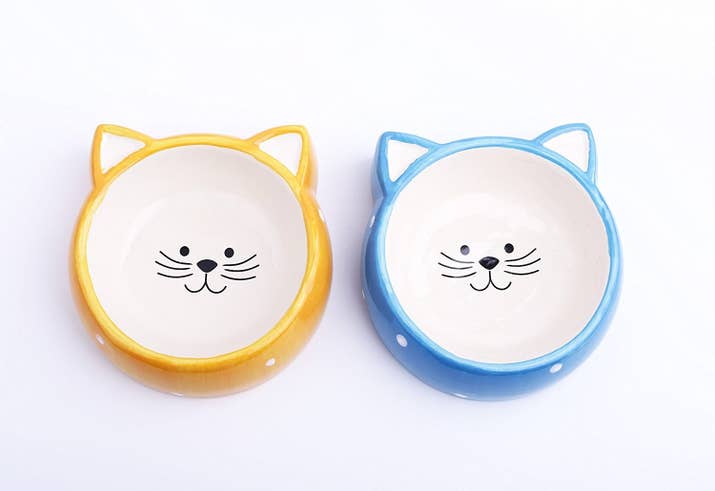 Promising review: "This bowl is perfect for a small- to medium-sized pet. I purchased it in yellow for my cat, and it's orange-yellow just like the picture. I've already washed it and nothing faded or flecked off because it's glazed." —BelindaGet it from Amazon for $9.99 (available in two colors).