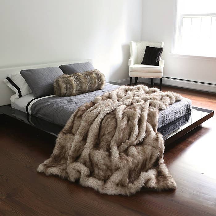 Faux fur blanket on a bed