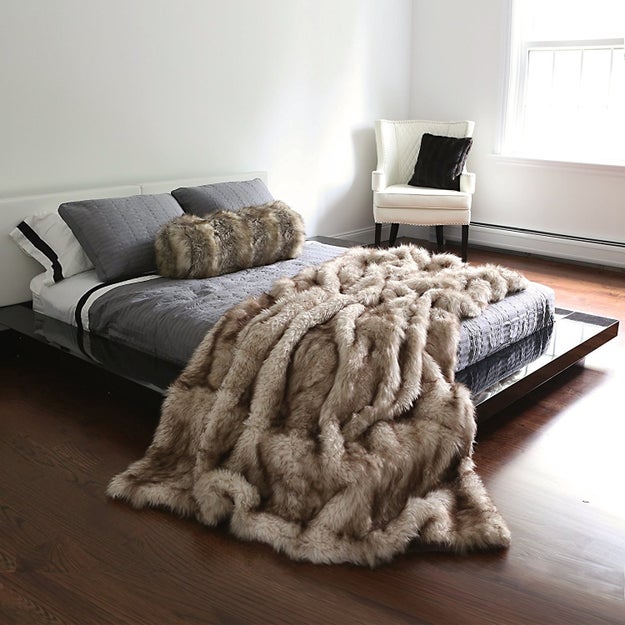 An incredibly real-looking faux fur throw blanket to give any home a touch of interior-design-magazine-meets-Winterfell luxe.