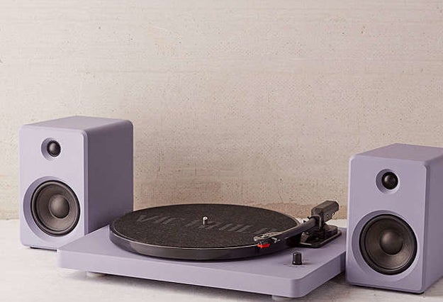 A pretty lavender turntable with speakers you can use to play your favorite records or your go-to playlist — just connect your device via bluetooth.