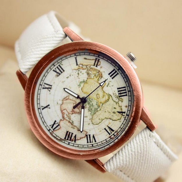 A map dial watch, because it's easy to lose track of time while daydreaming about a vacation abroad.